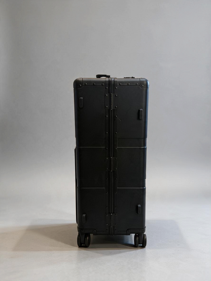 Paradox Aviation 30-inch GEN2 professional flight crew check-in luggage in matte black with four-wheel design.