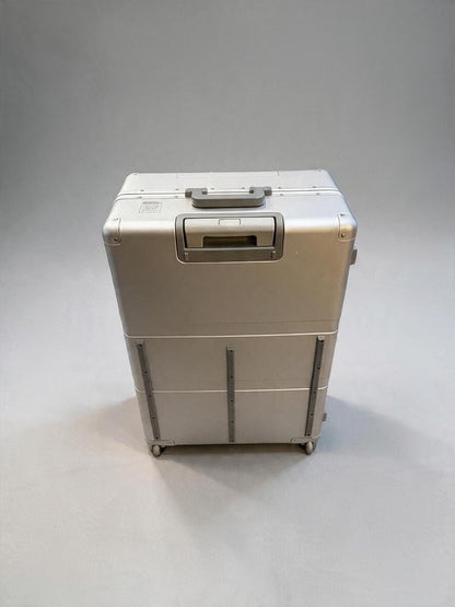 Paradox Aviation 30-inch GEN2 professional flight crew check-aboard luggage in silver with a retractable handle.