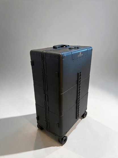 Paradox Aviation 30-inch GEN2 professional flight crew check-in luggage in matte black with four wheels and cargo track.