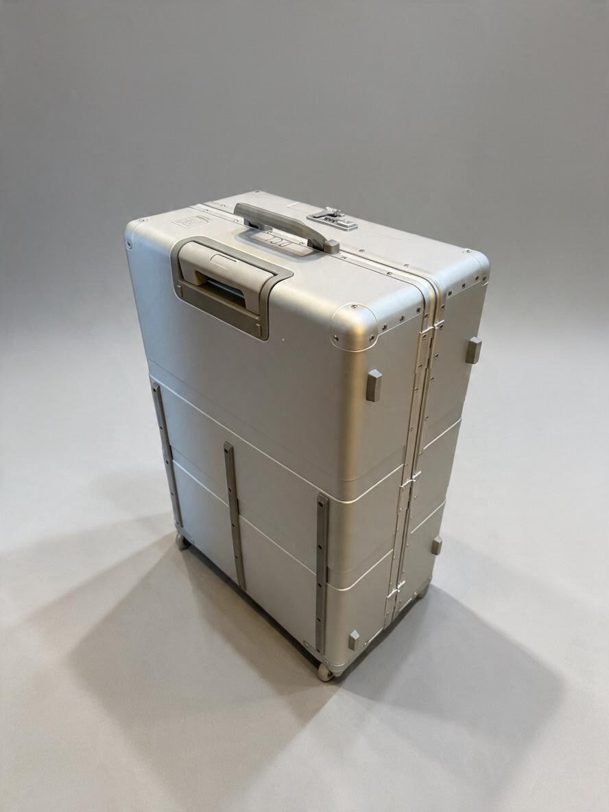 Paradox Aviation 30-inch GEN2 professional flight crew check-aboard luggage in starlight silver with matte grey handle.