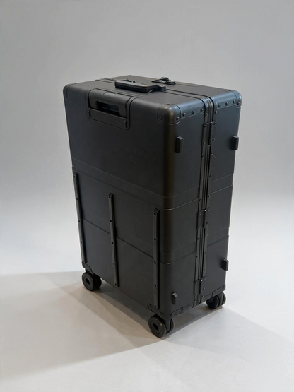 Paradox Aviation 30-inch GEN2 professional flight crew check-aboard luggage in matte black with four wheels.