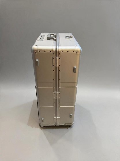 Paradox Aviation 30-inch GEN2 professional flight crew check-aboard luggage in silver with reinforced metal hinges.