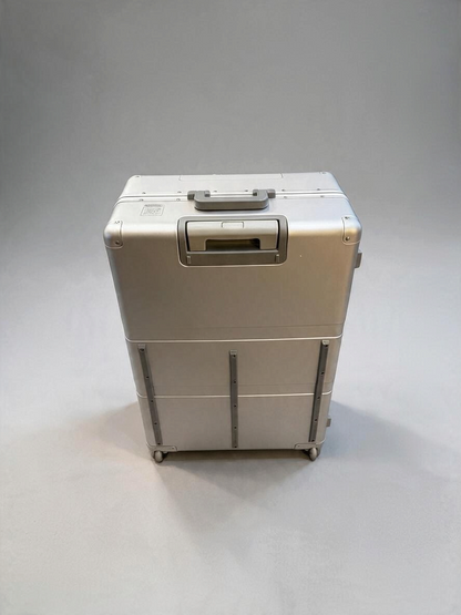 Paradox Aviation 30-inch GEN2 silver hard-shell flight crew check-in luggage with retractable handle and wheels.