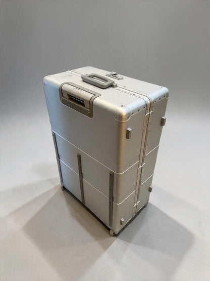 Paradox Aviation 30-inch GEN2 Frequent Flyer check-in luggage in starlight silver with matte grey handle and wheels.