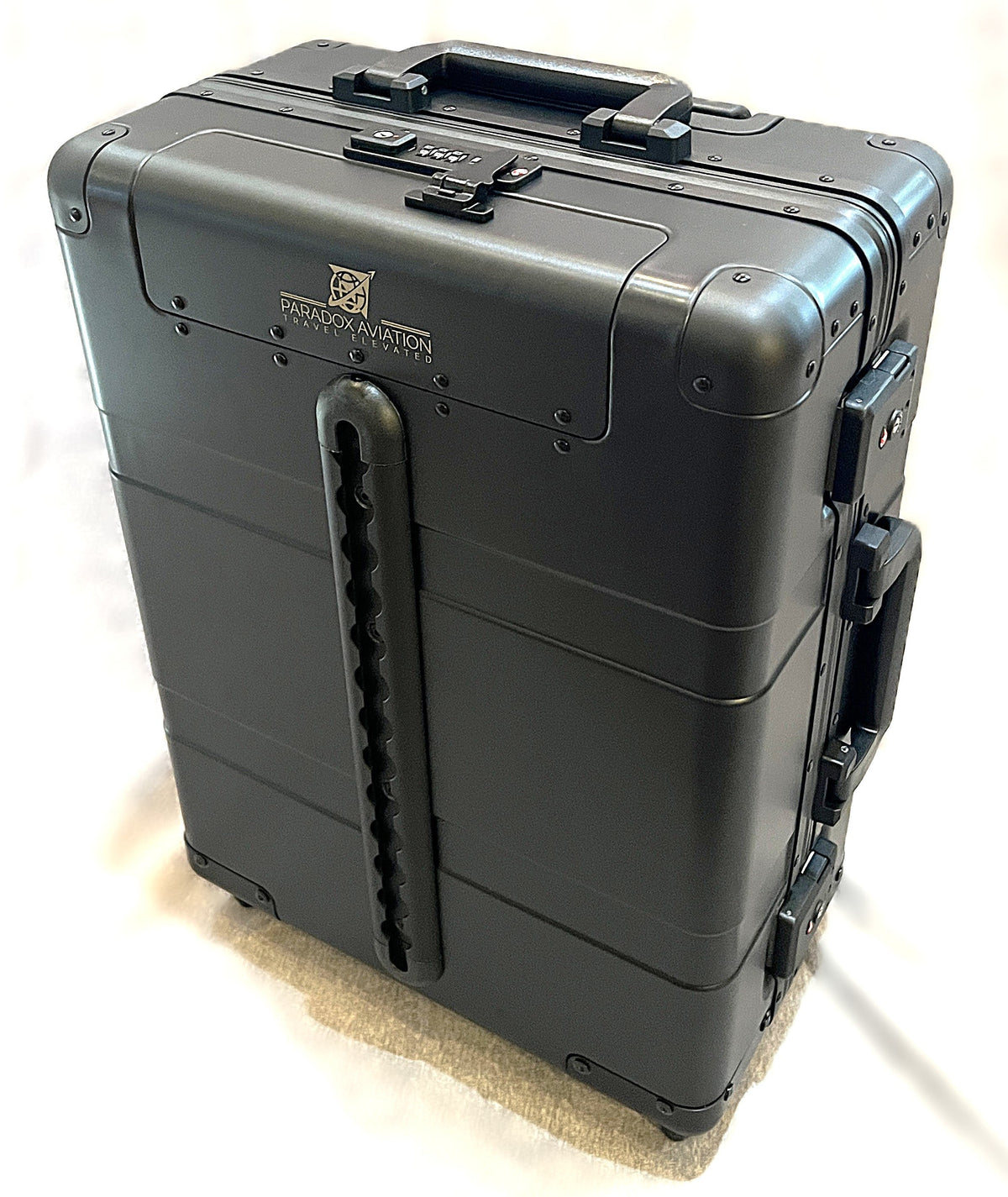 Paradox Aviation GEN2 22-inch professional flight crew roll-aboard suitcase in black aluminum with cargo track.