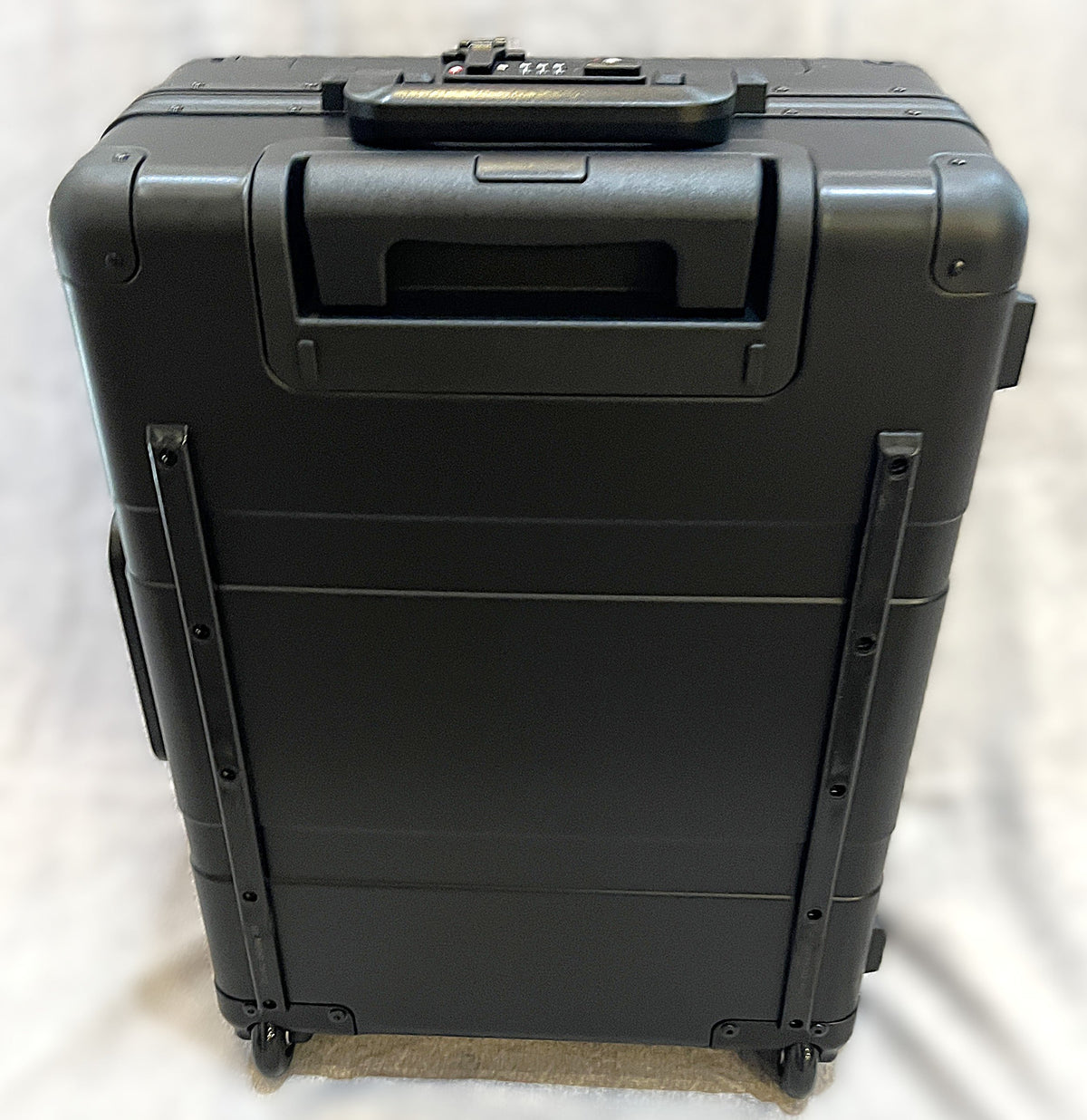 Paradox Aviation GEN2 22-inch professional flight crew roll aboard suitcase in black aluminum with two-wheel design.