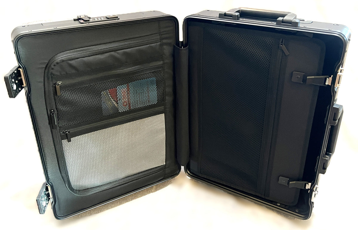 Open Paradox Aviation 22-inch GEN2 flight crew roll aboard case showing black interior mesh pockets and organization.