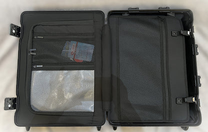 Open interior of Paradox Aviation 22-inch GEN2 flight crew roll aboard featuring black mesh pockets and wet bag.