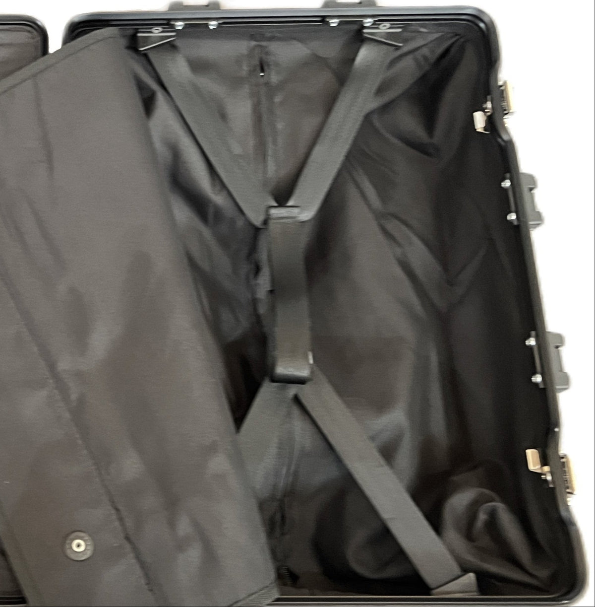 Interior of a Paradox Aviation GEN2 22-inch flight crew roll aboard case featuring black lining and packing straps.