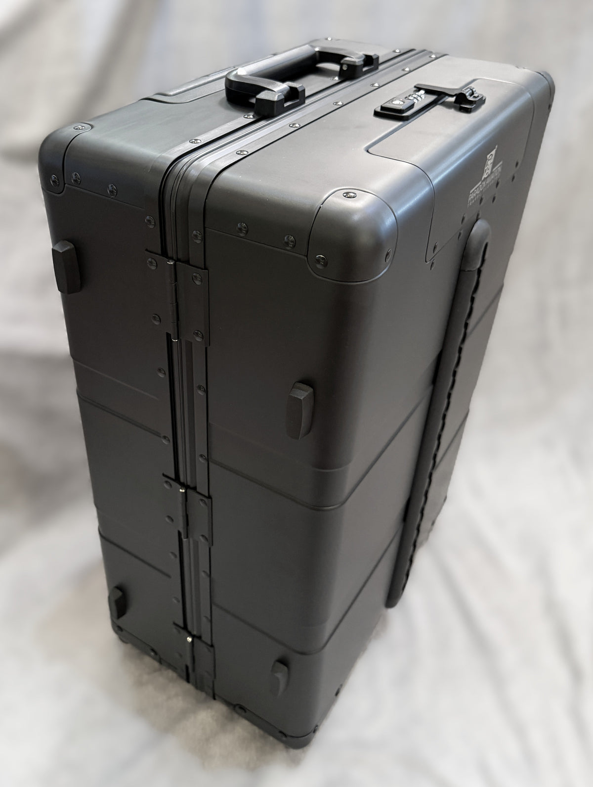 Paradox Aviation 25-inch GEN2 professional flight crew roll aboard luggage in matte black with reinforced hinges.