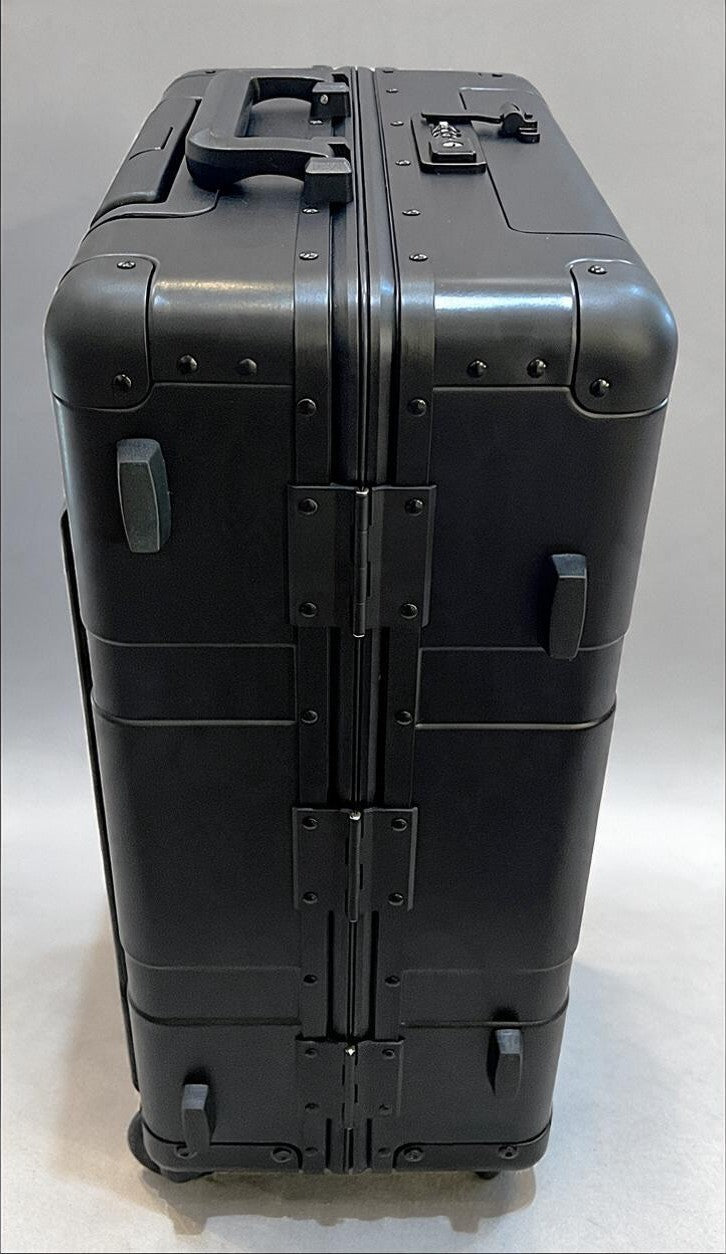 Paradox Aviation 30-inch GEN2 professional flight crew check-in luggage in matte black with reinforced hinges.