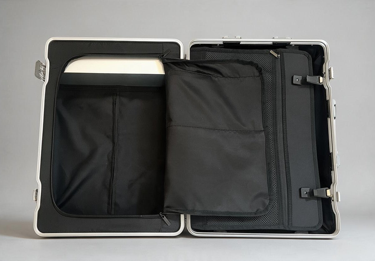 Interior view of the Paradox Aviation GEN2 30-inch flight crew suitcase showing black fabric lining and storage flaps.