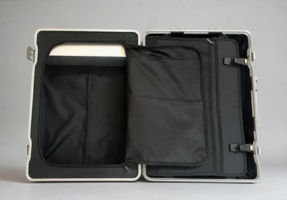 Interior view of the Paradox Aviation GEN2 30-inch flight crew suitcase showing black fabric lining and storage flaps.