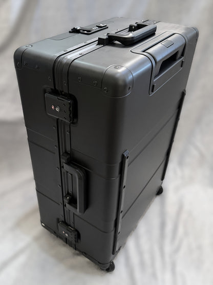 Paradox Aviation 25-inch GEN2 professional flight crew roll-aboard luggage in matte black with durable metal casing.