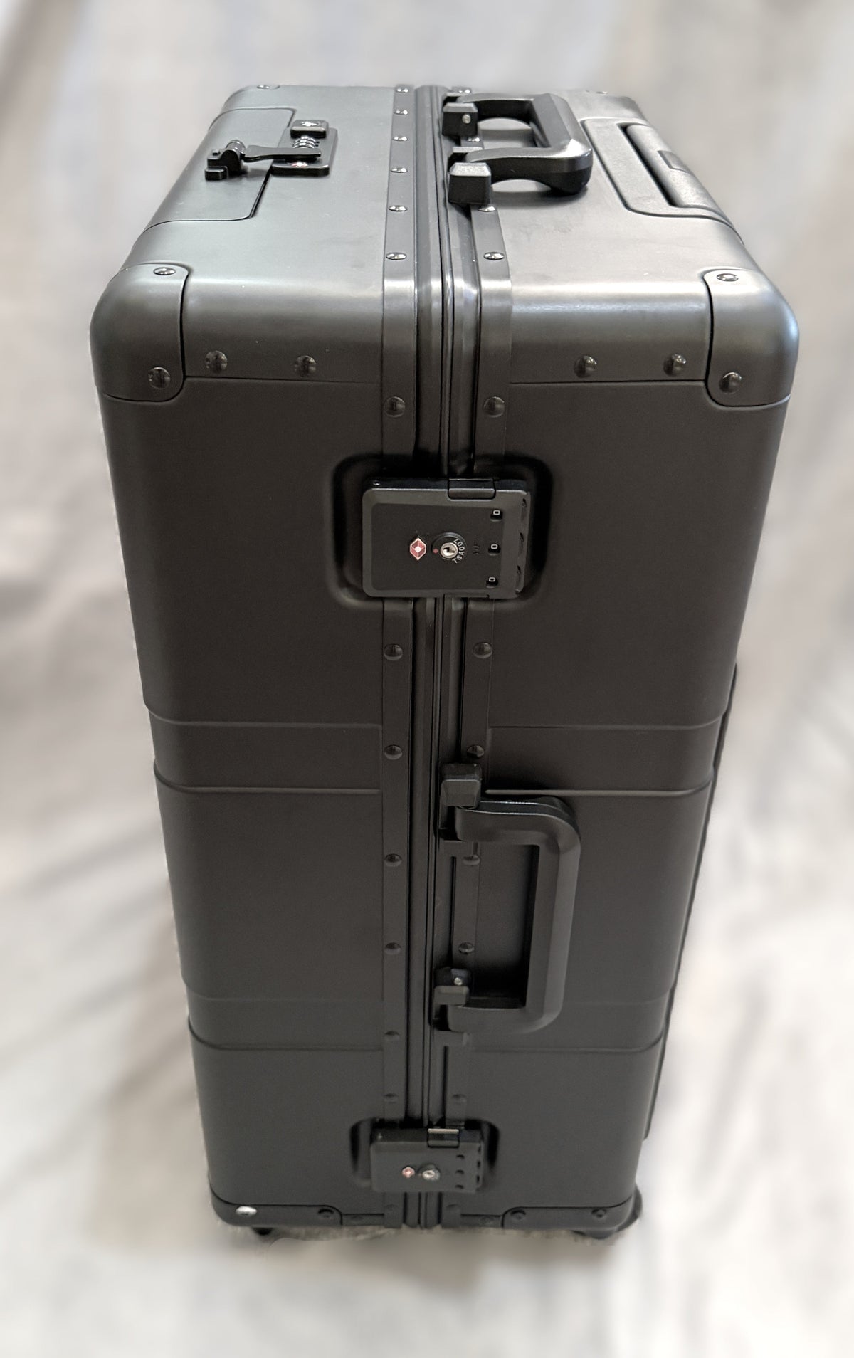 Paradox Aviation GEN2 25-inch professional flight crew roll aboard suitcase in matte black with TSA locks.
