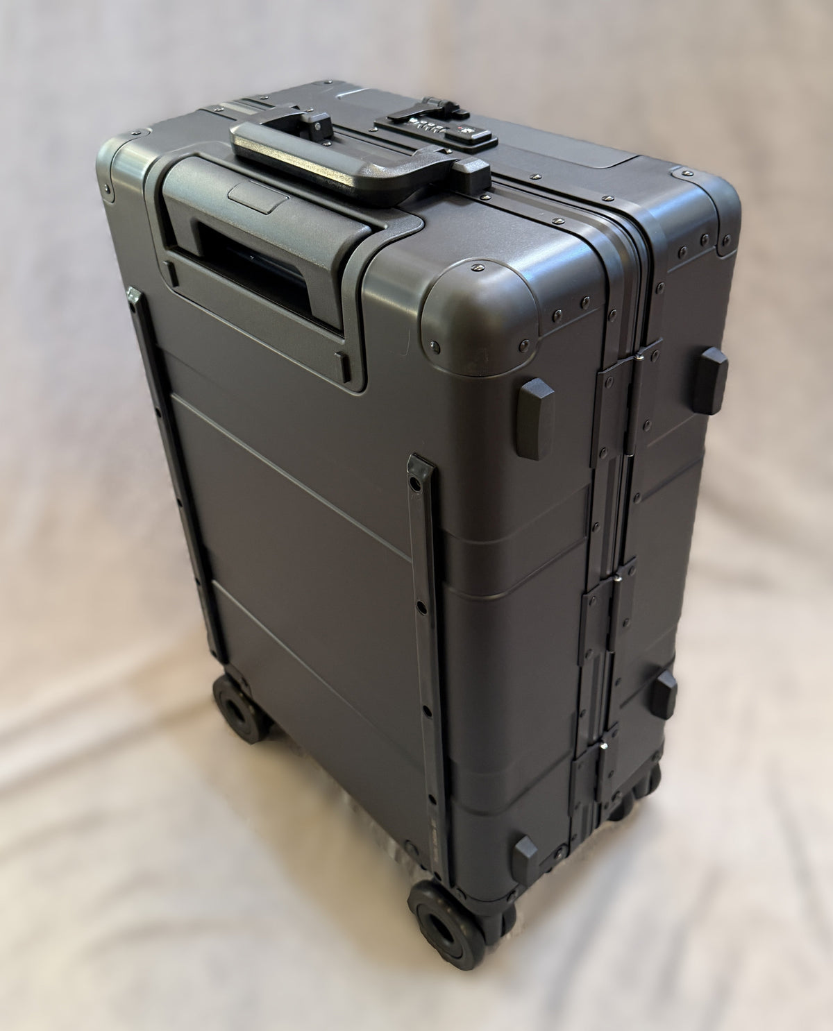 Paradox Aviation 22 inch GEN2 Frequent Flyer carry-on luggage in dark sky matte black with four wheels and durable metal frame.