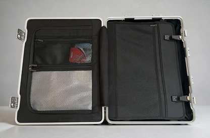 Open interior of Paradox Aviation 30 inch GEN2 Frequent Flyer suitcase showing mesh pockets and storage compartments