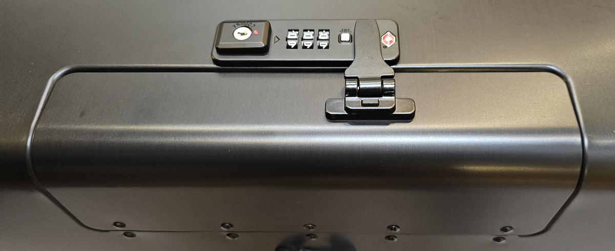 Paradox Aviation GEN2 Frequent Flyer check-in luggage featuring a secure TSA-approved combination lock mechanism.