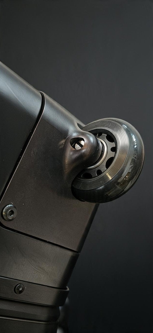 Close-up of a durable matte grey wheel on a Paradox Aviation GEN2 professional flight crew check-in luggage case.
