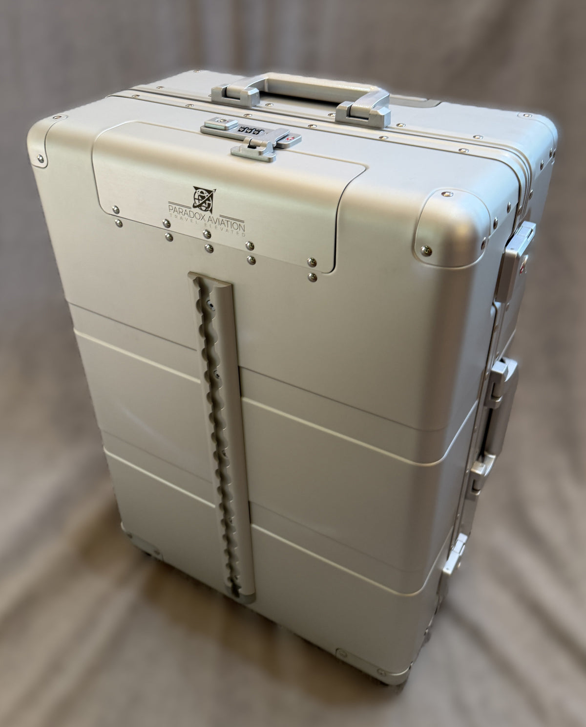 Paradox Aviation 25-inch GEN2 silver hard-shell flight crew roll-aboard suitcase with cargo track and combination lock
