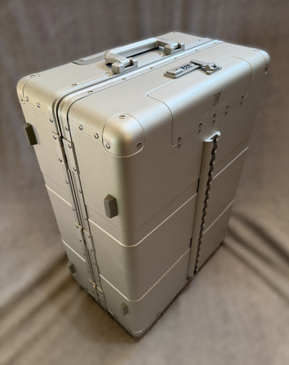 Paradox Aviation 25-inch GEN2 silver hard-shell flight crew roll aboard luggage with reinforced metal construction.