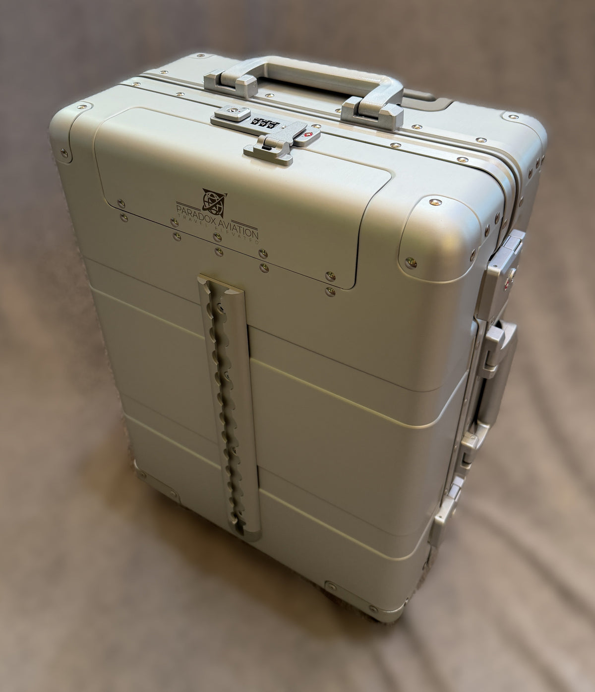 Paradox Aviation GEN2 22-inch silver aluminum flight crew roll aboard suitcase with front cargo track and TSA lock.
