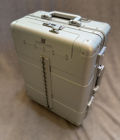 Paradox Aviation GEN2 22-inch silver aluminum flight crew roll aboard suitcase with front cargo track and TSA lock.