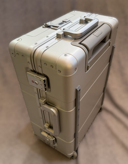 Paradox Aviation 22-inch GEN2 silver aluminum professional flight crew roll aboard suitcase with two-wheel design.