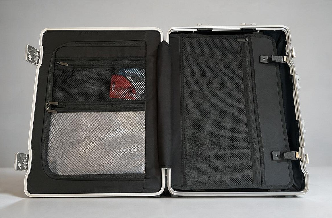 Interior view of the Paradox Aviation GEN2 30-inch flight crew suitcase showing black mesh storage compartments.