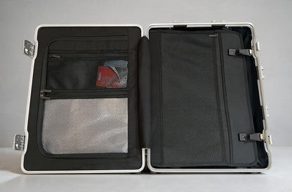 Interior view of the Paradox Aviation GEN2 30-inch flight crew suitcase showing black mesh storage compartments.
