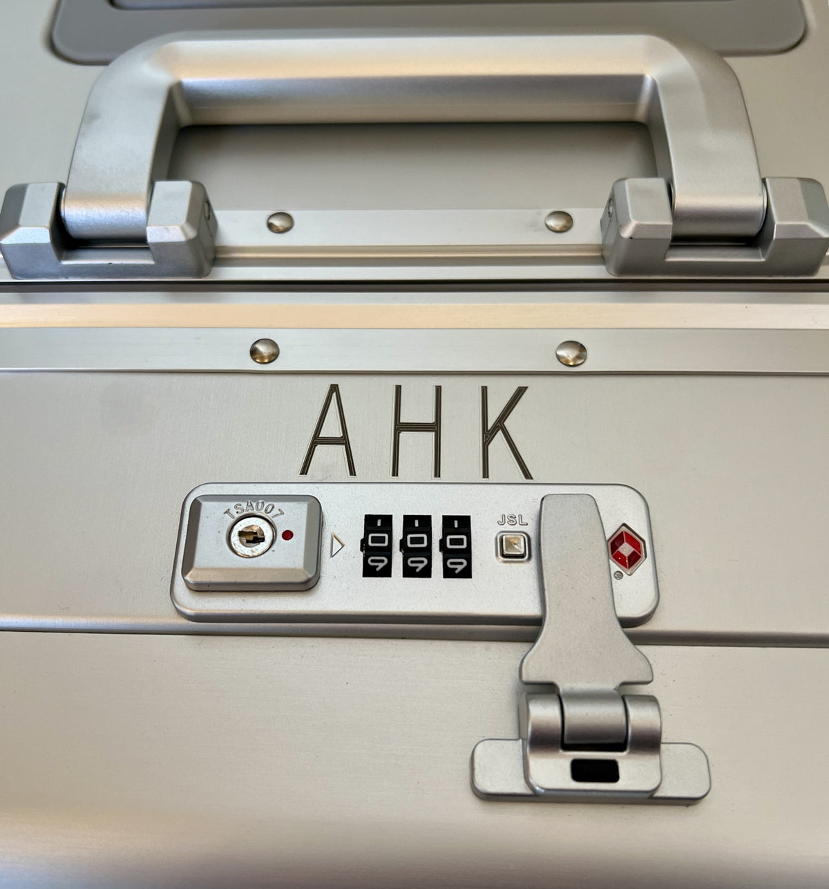 Paradox Aviation GEN2 Frequent Flyer carry-on luggage in starlight matte silver with custom laser-etched initials and TSA lock