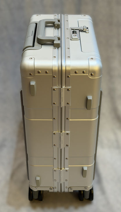 Paradox Aviation 22-inch GEN2 Frequent Flyer hard-shell carry-on suitcase in starlight matte silver with matte grey handle.