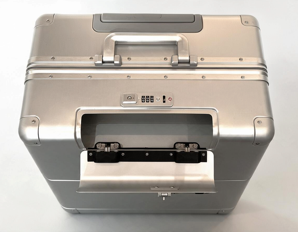 Paradox Aviation 30 inch GEN2 Frequent Flyer check-in luggage in starlight silver with TSA lock and matte grey handle.