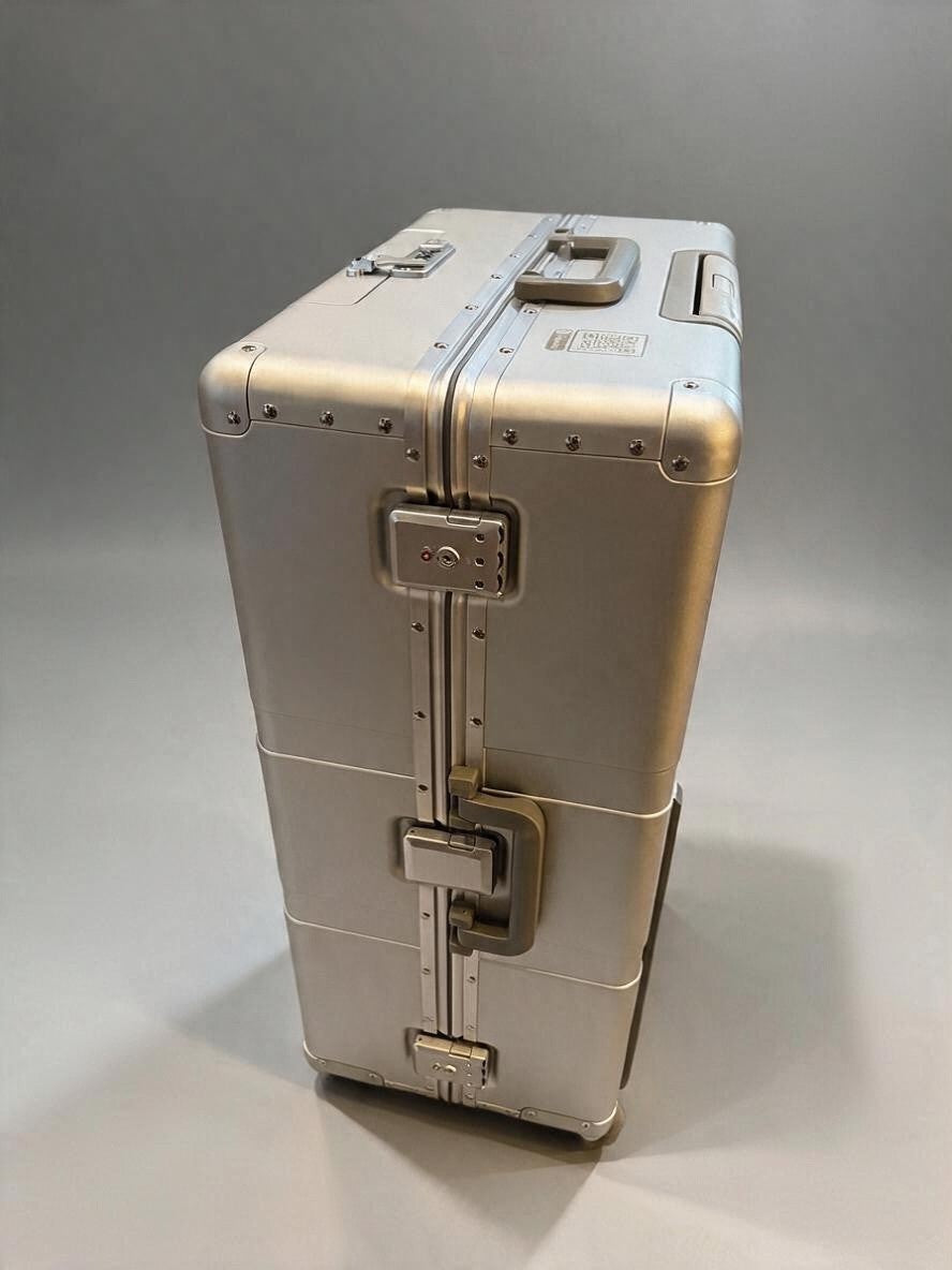 Paradox Aviation 30-inch GEN2 Frequent Flyer 2-wheel check-in luggage in starlight silver with matte grey handles.
