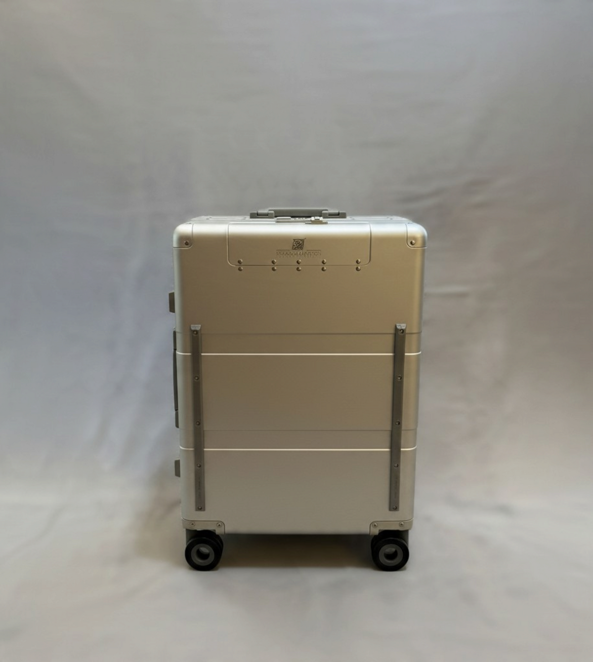 Paradox Aviation 25-inch GEN2 Frequent Flyer aluminum hard-shell roll aboard luggage in starlight silver with matte grey wheels.