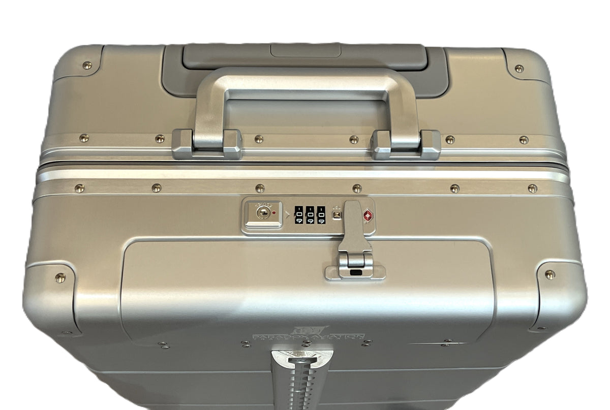 Paradox Aviation GEN2 22-inch silver aluminum roll aboard carry-on luggage with TSA lock and retractable handle.